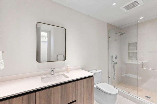 1020 Sunset Point Rd Unit 410, Clearwater, FL 33756 - bathroom featuring toilet, a stall shower, vanity, tile patterned flooring, and recessed lighting