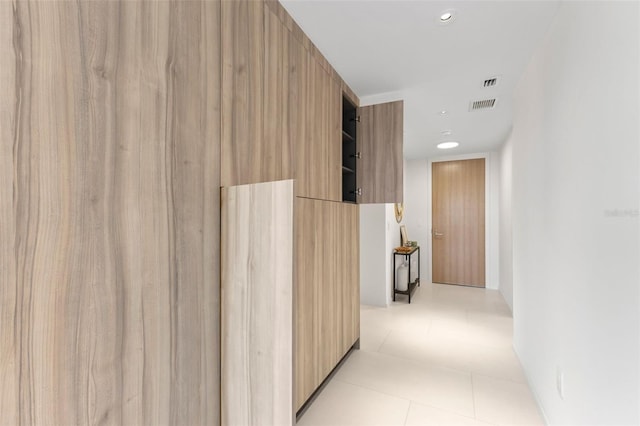 1020 Sunset Point Rd Unit 410, Clearwater, FL 33756 - hallway with recessed lighting and light floors