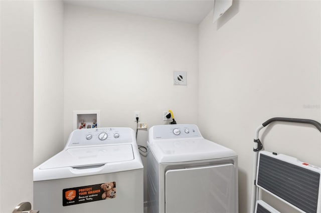 1020 Sunset Point Rd Unit 410, Clearwater, FL 33756 - laundry area with independent washer and dryer