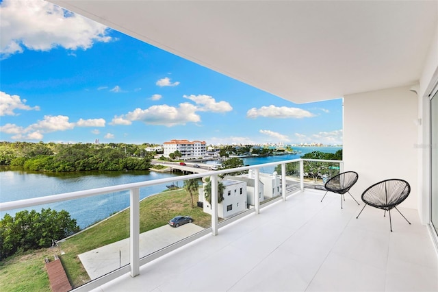 1020 Sunset Point Rd Unit 410, Clearwater, FL 33756 - balcony featuring a water view