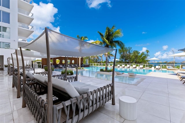 1020 Sunset Point Rd Unit 410, Clearwater, FL 33756 - community pool with a patio