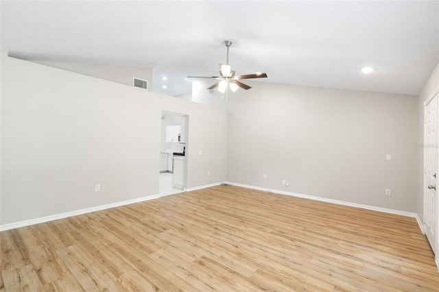 9721 Fredericksburg Rd, Tampa, FL 33635 - spare room featuring a ceiling fan, lofted ceiling, light wood-type flooring, recessed lighting, and baseboards