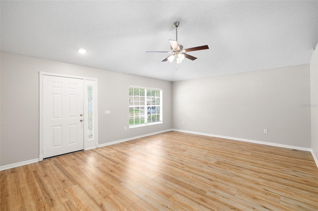 9721 Fredericksburg Rd, Tampa, FL 33635 - entrance foyer with a ceiling fan, light wood-style floors, baseboards, and recessed lighting