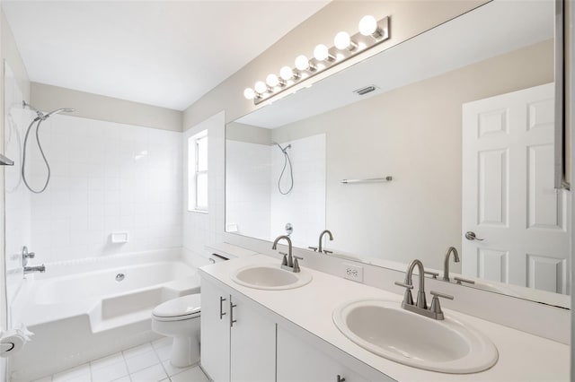 9721 Fredericksburg Rd, Tampa, FL 33635 - full bathroom with  shower combination, toilet, double vanity, and tile patterned floors