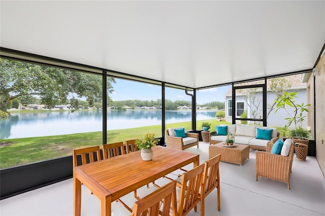 9721 Fredericksburg Rd, Tampa, FL 33635 - sunroom featuring a water view, an outdoor hangout area, and healthy amount of natural light