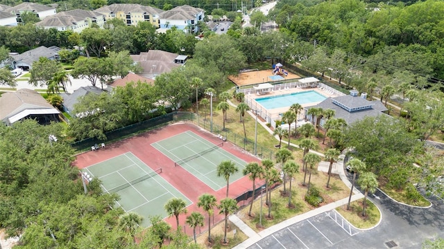 9721 Fredericksburg Rd, Tampa, FL 33635 - aerial perspective of suburban area with a pool
