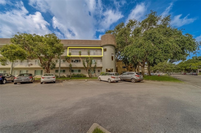 2441 Persian Dr Unit 61, Clearwater, FL 33763 - view of property featuring uncovered parking