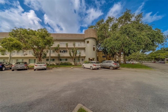 2441 Persian Dr Unit 61, Clearwater, FL 33763 - view of property featuring uncovered parking