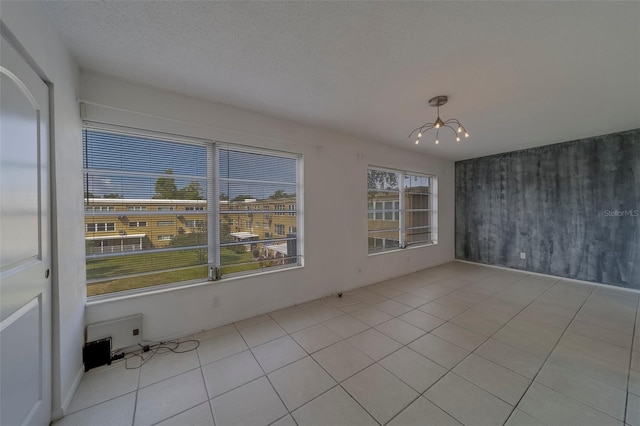 2441 Persian Dr Unit 61, Clearwater, FL 33763 - unfurnished room featuring a chandelier