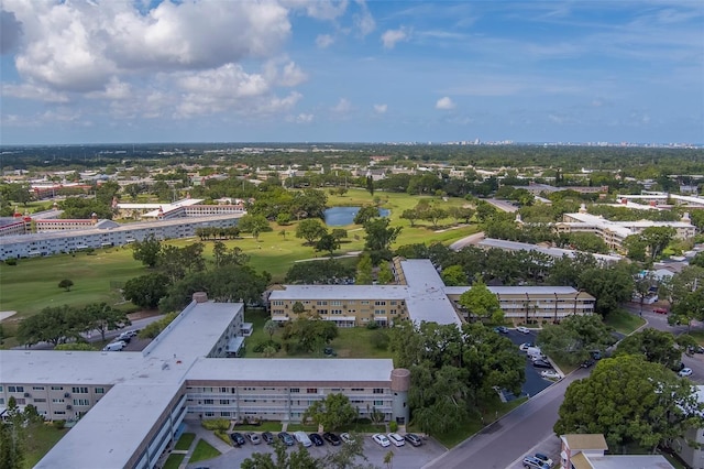 2441 Persian Dr Unit 61, Clearwater, FL 33763 - aerial view of apartment complex, a golf club, and a large body of water