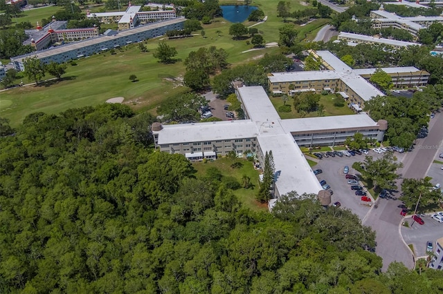 2441 Persian Dr Unit 61, Clearwater, FL 33763 - view of property location featuring a golf club, a large body of water, and apartment complex