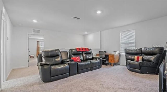 10448 Ladybug Cv, Parrish, FL 34219 - carpeted home theater featuring recessed lighting and plenty of natural light