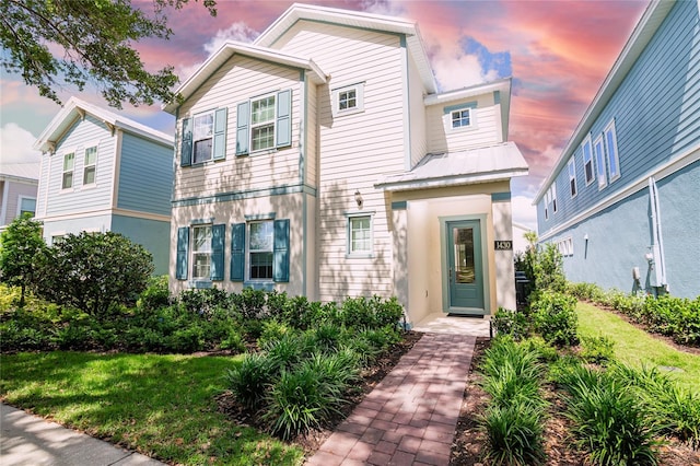 1430 Reunion Blvd, Reunion, FL 34747 - view of front of home featuring stucco siding