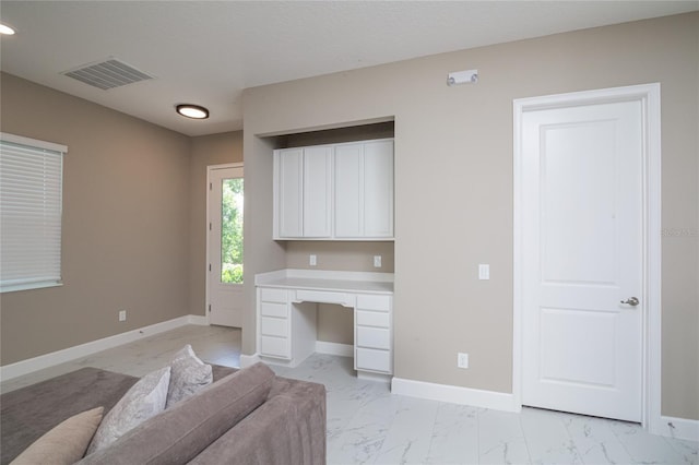 1430 Reunion Blvd, Reunion, FL 34747 - living area featuring light marble finish floors, baseboards, and recessed lighting