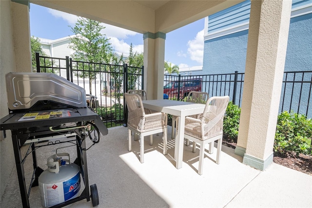 1430 Reunion Blvd, Reunion, FL 34747 - balcony featuring area for grilling and outdoor dining area
