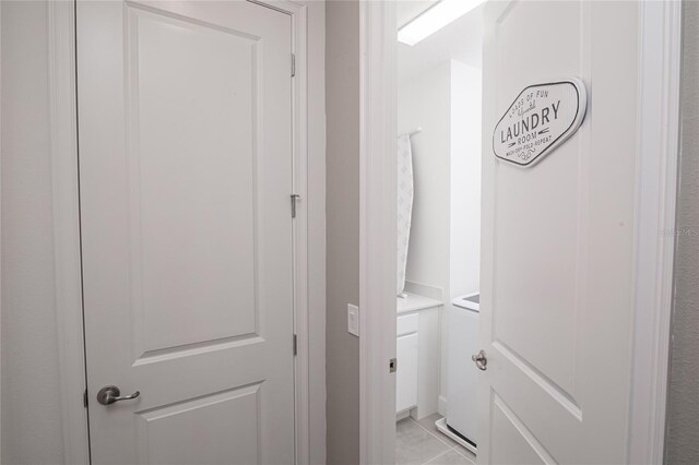 1430 Reunion Blvd, Reunion, FL 34747 - hall with light tile patterned flooring