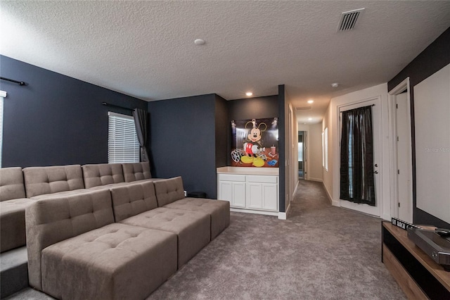 1430 Reunion Blvd, Reunion, FL 34747 - living area featuring a textured ceiling and carpet floors