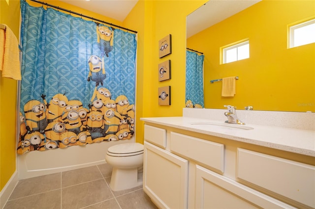 1430 Reunion Blvd, Reunion, FL 34747 - bathroom featuring vanity, tile patterned flooring, toilet, and shower / tub combo with curtain