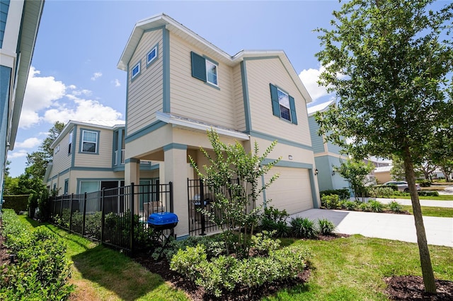 1430 Reunion Blvd, Reunion, FL 34747 - view of front of house featuring an attached garage, stucco siding, and driveway