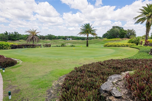 1430 Reunion Blvd, Reunion, FL 34747 - surrounding community with golf course view and a lawn