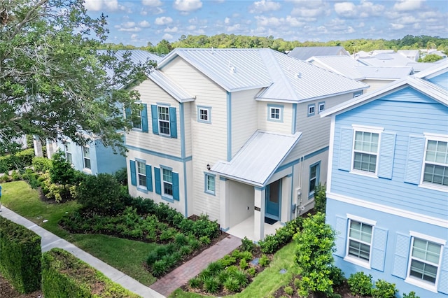 1430 Reunion Blvd, Reunion, FL 34747 - view of front of property with metal roof