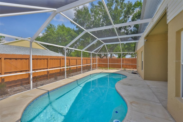 11726 S Stone Ln, Riverview, FL 33569 - view of swimming pool with a fenced backyard, a patio area, and glass enclosure