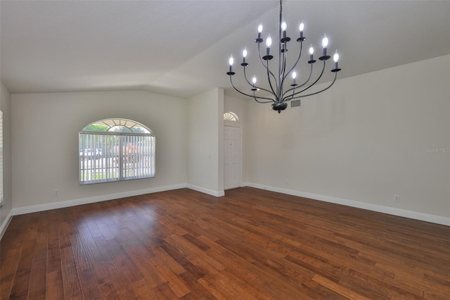11726 S Stone Ln, Riverview, FL 33569 - spare room with dark wood-style floors, lofted ceiling, a chandelier, and baseboards
