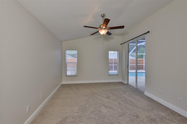 11726 S Stone Ln, Riverview, FL 33569 - carpeted empty room featuring a ceiling fan, baseboards, and vaulted ceiling