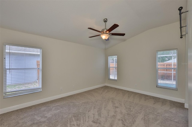 11726 S Stone Ln, Riverview, FL 33569 - empty room featuring lofted ceiling, plenty of natural light, carpet, baseboards, and a ceiling fan