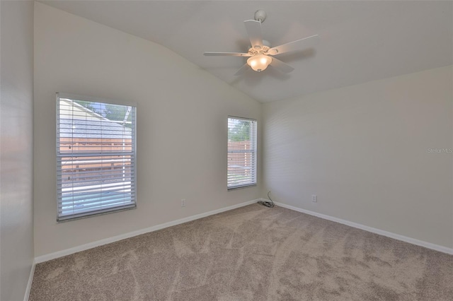 11726 S Stone Ln, Riverview, FL 33569 - unfurnished room with light colored carpet, a ceiling fan, vaulted ceiling, and baseboards