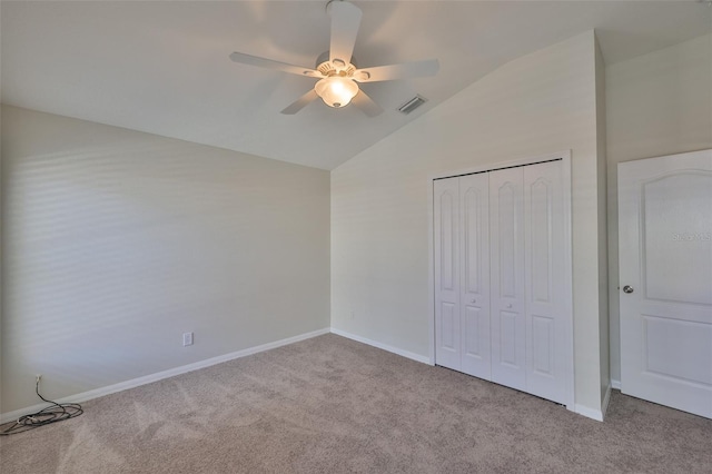 11726 S Stone Ln, Riverview, FL 33569 - unfurnished bedroom featuring lofted ceiling, carpet floors, a closet, and baseboards