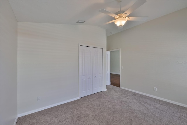 11726 S Stone Ln, Riverview, FL 33569 - unfurnished bedroom featuring lofted ceiling, carpet floors, a closet, baseboards, and a ceiling fan