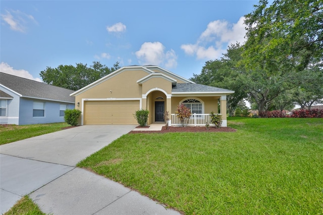 11726 S Stone Ln, Riverview, FL 33569 - ranch-style home with stucco siding, a front yard, a garage, covered porch, and driveway