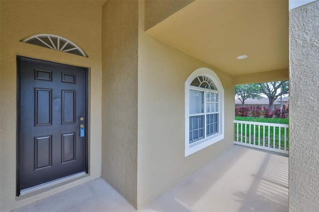11726 S Stone Ln, Riverview, FL 33569 - entrance to property with stucco siding and covered porch