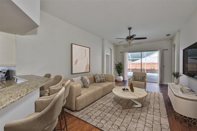 11726 S Stone Ln, Riverview, FL 33569 - living room with dark wood-type flooring and a ceiling fan