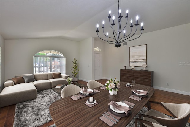 11726 S Stone Ln, Riverview, FL 33569 - dining area with wood finished floors, baseboards, a chandelier, and lofted ceiling