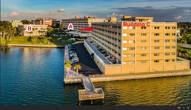 100 Bluff View Dr Unit 514C, Belleair Bluffs, FL 33770 - view of apartment building / complex with a water view