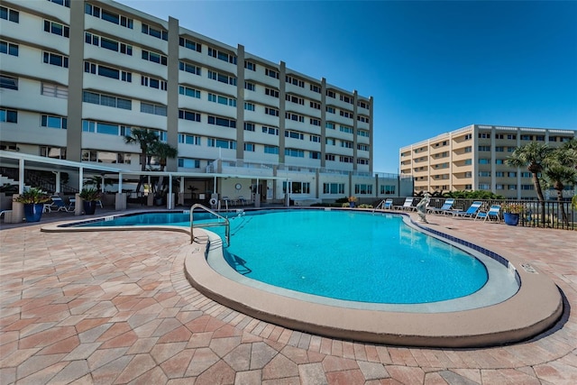 100 Bluff View Dr Unit 514C, Belleair Bluffs, FL 33770 - community pool with a patio area
