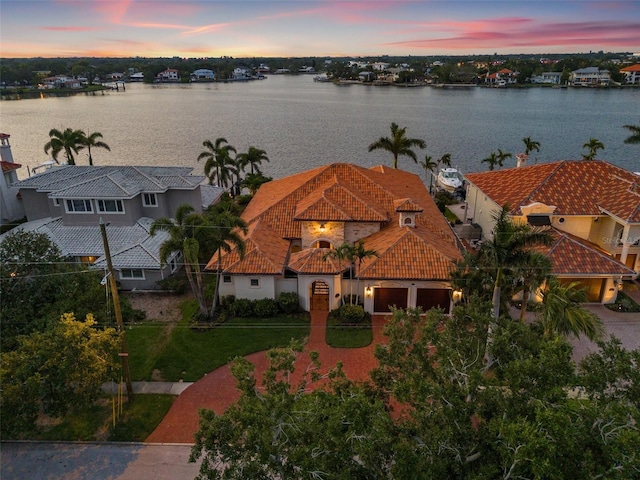 301 Bayview Dr NE, Saint Petersburg, FL 33704 - aerial view at dusk of a water view