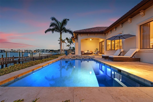 301 Bayview Dr NE, Saint Petersburg, FL 33704 - view of swimming pool featuring a patio area