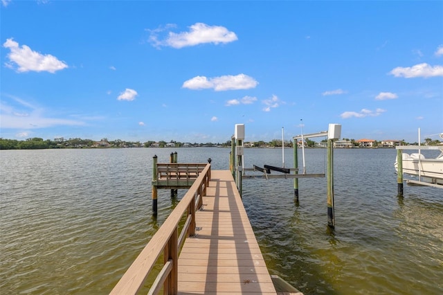 301 Bayview Dr NE, Saint Petersburg, FL 33704 - dock with boat lift and a water view