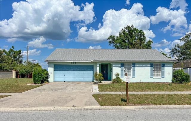 502 Chilt Dr, Brandon, FL 33510 - single story home featuring a front lawn, a garage, stucco siding, and concrete driveway