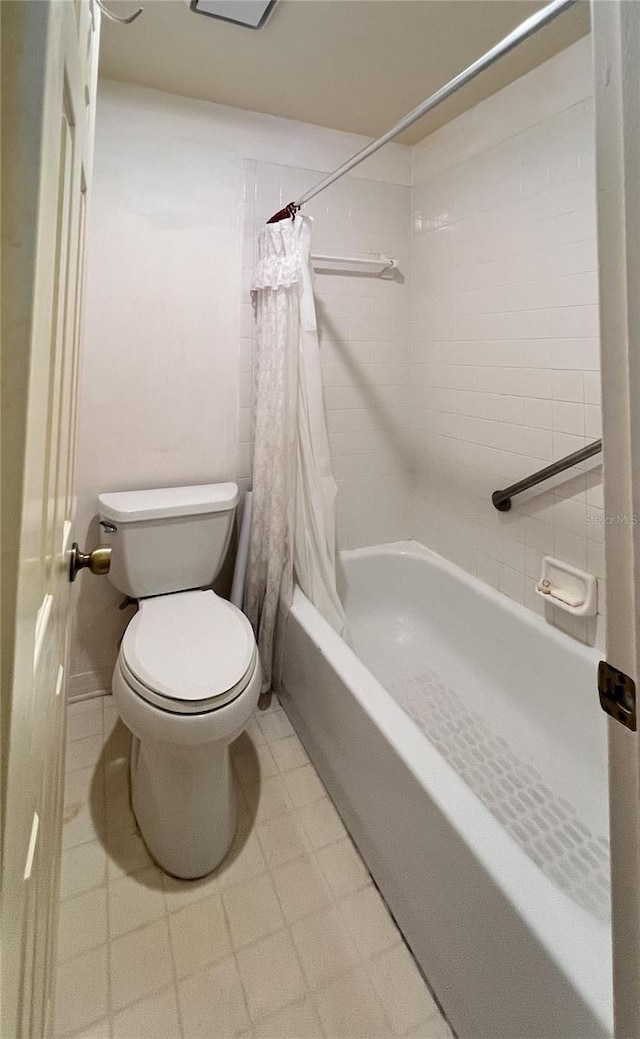 502 Chilt Dr, Brandon, FL 33510 - full bath with shower / bathtub combination with curtain, toilet, and tile patterned floors