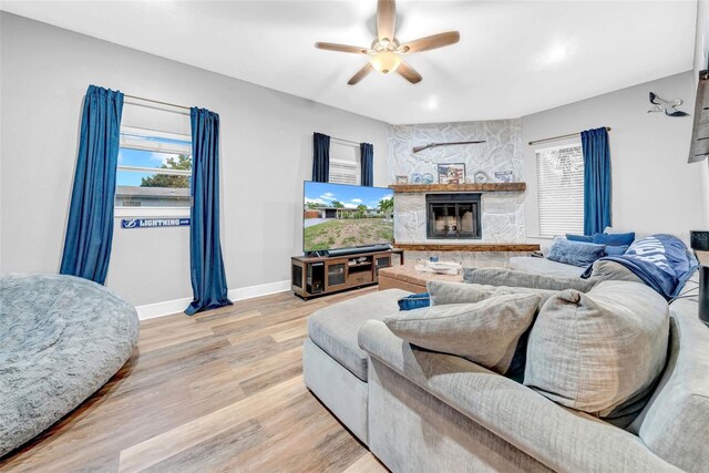 4726 W Fairview Hts, Tampa, FL 33616 - living area with baseboards, light wood-style floors, a ceiling fan, a fireplace, and recessed lighting