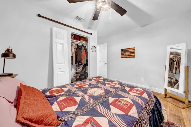 4726 W Fairview Hts, Tampa, FL 33616 - bedroom featuring a closet, wood finished floors, ceiling fan, and baseboards