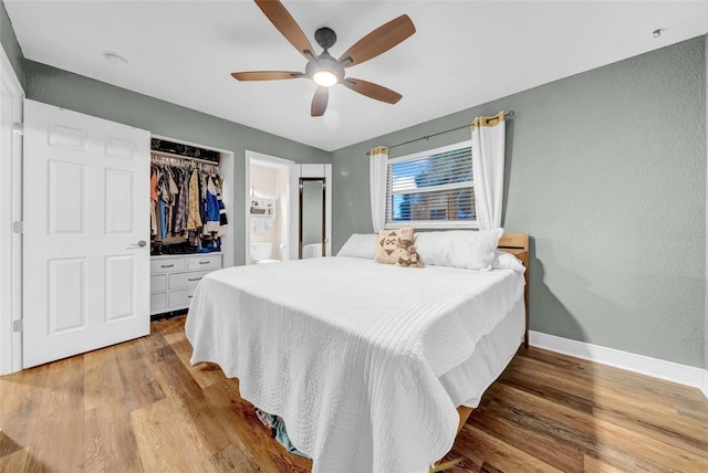 4726 W Fairview Hts, Tampa, FL 33616 - bedroom featuring baseboards, light wood-style floors, ceiling fan, a closet, and a textured wall