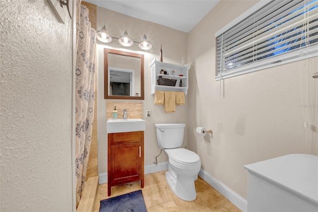 4726 W Fairview Hts, Tampa, FL 33616 - bathroom with vanity, toilet, curtained shower, and baseboards