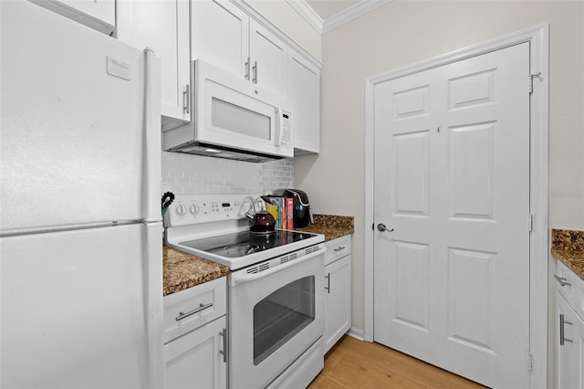 800 S Dakota Ave Unit 337, Tampa, FL 33606 - kitchen with white appliances, ornamental molding, decorative backsplash, white cabinetry, and light wood finished floors