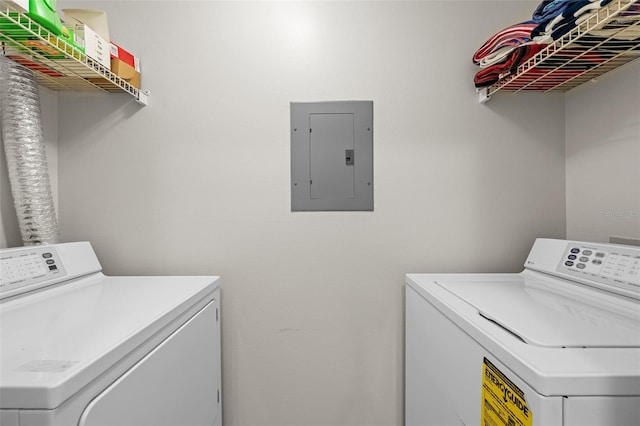 800 S Dakota Ave Unit 337, Tampa, FL 33606 - laundry area with electric panel and separate washer and dryer