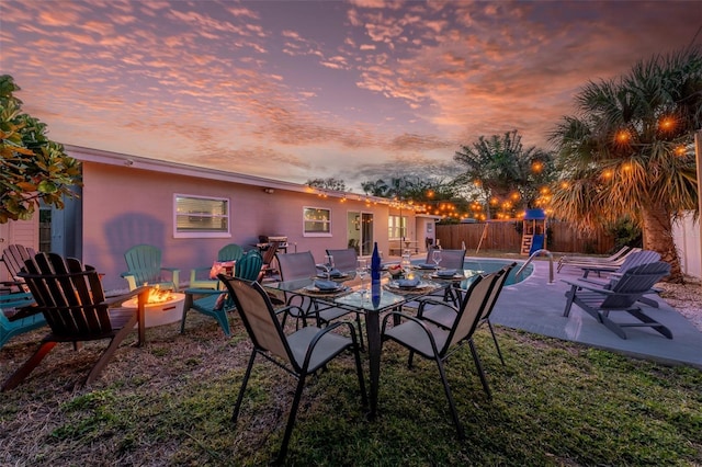 3485 Floral Dr, Largo, FL 33771 - view of patio / terrace featuring an outdoor fire pit
